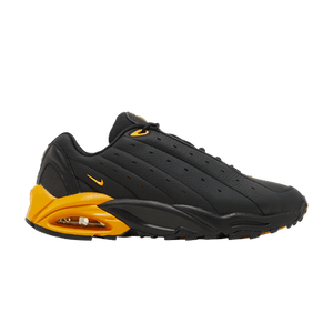 NOCTA x Nike Hot Step Air Terra 'Black University Gold'