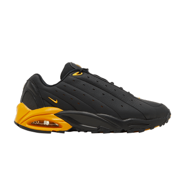 NOCTA x Nike Hot Step Air Terra 'Black University Gold'